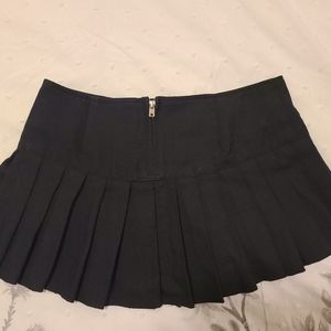 Tripp NYC black pleated skirt